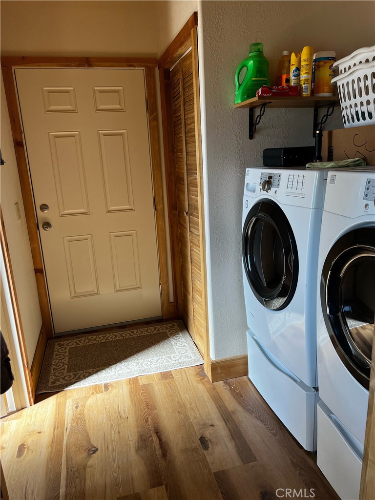 98443 Sierra Meadow Road Inyokern, CA 93527 - Photo 14 of 62 a view of entryway with washer and dryer