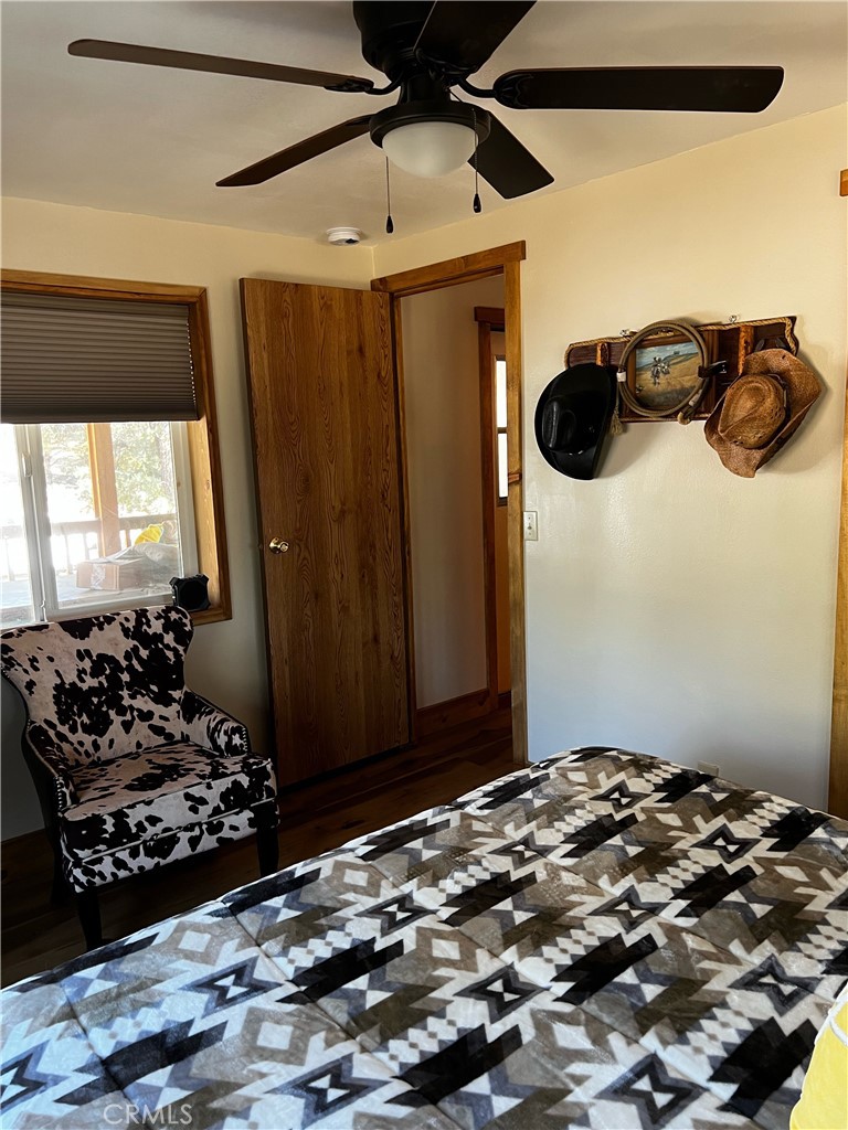 98443 Sierra Meadow Road Inyokern, CA 93527 - Photo 22 of 62 a bedroom with a bed and a window