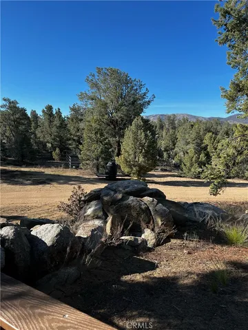 a view of a road with a yard