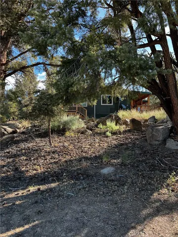 a view of a water heater and a floor to ceiling window