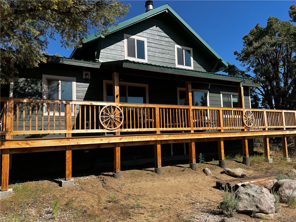 98443 Sierra Meadow Road Inyokern, CA 93527 - Photo 10 of 62 a front view of a house with a yard