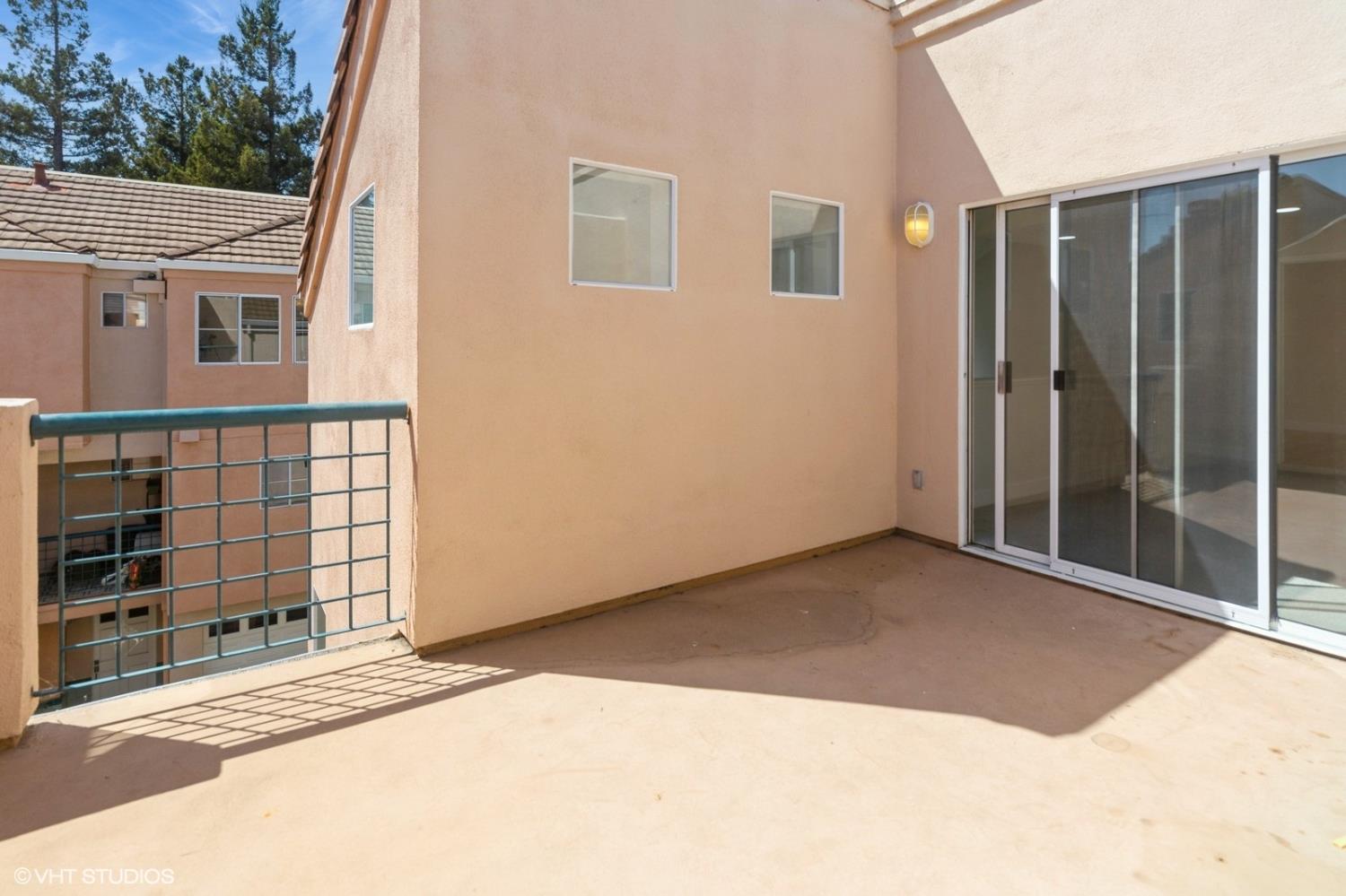 987 Asilomar Terrace, Unit 2 Sunnyvale, CA 94086 - Photo 19 of 48 a view of a house with a backyard and stairs