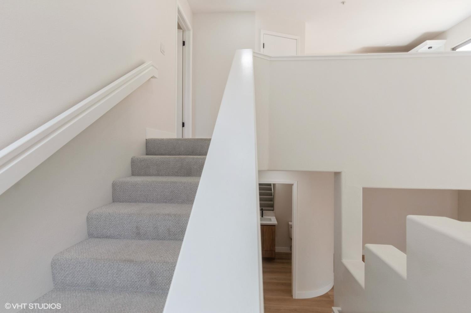 987 Asilomar Terrace, Unit 2 Sunnyvale, CA 94086 - Photo 27 of 48 a living room with furniture and a ceiling fan