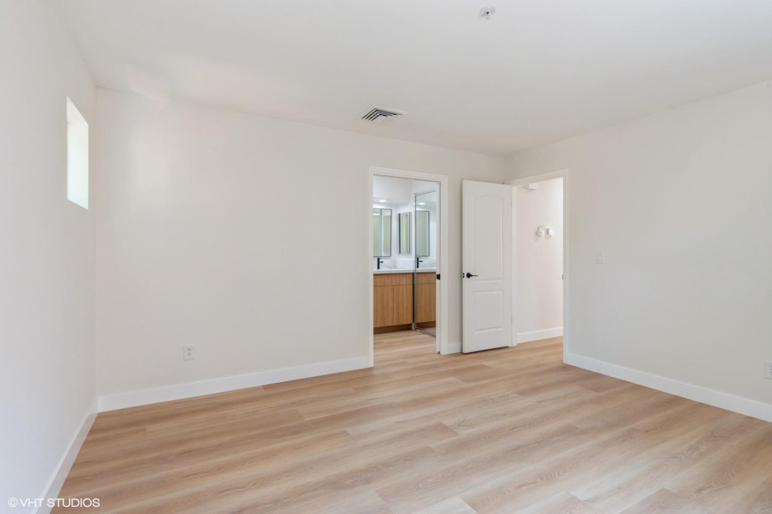 987 Asilomar Terrace, Unit 2 Sunnyvale, CA 94086 - Photo 30 of 48 a view of empty room with wooden floor