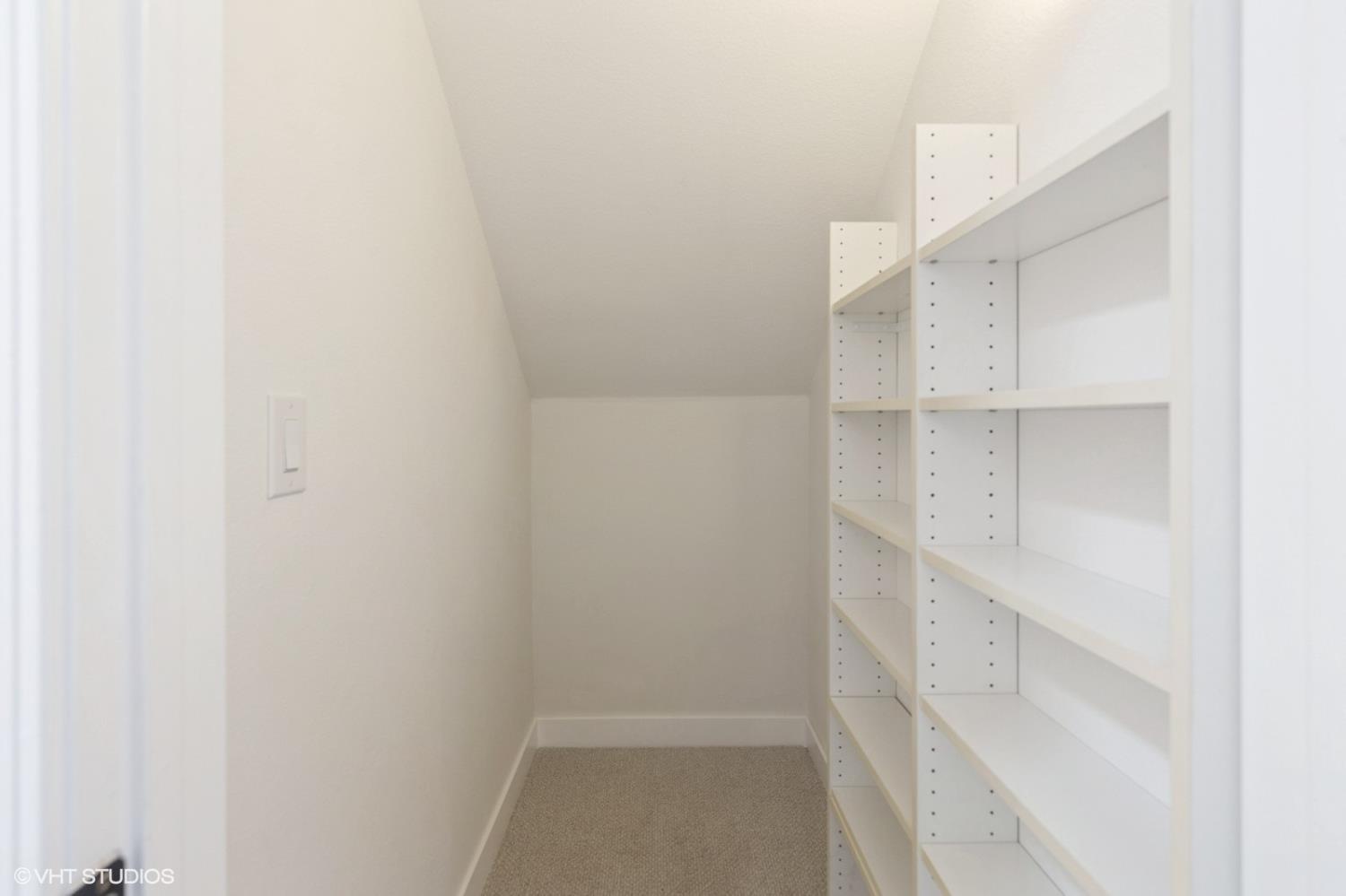 987 Asilomar Terrace, Unit 2 Sunnyvale, CA 94086 - Photo 37 of 48 a view of walk in closet with empty racks