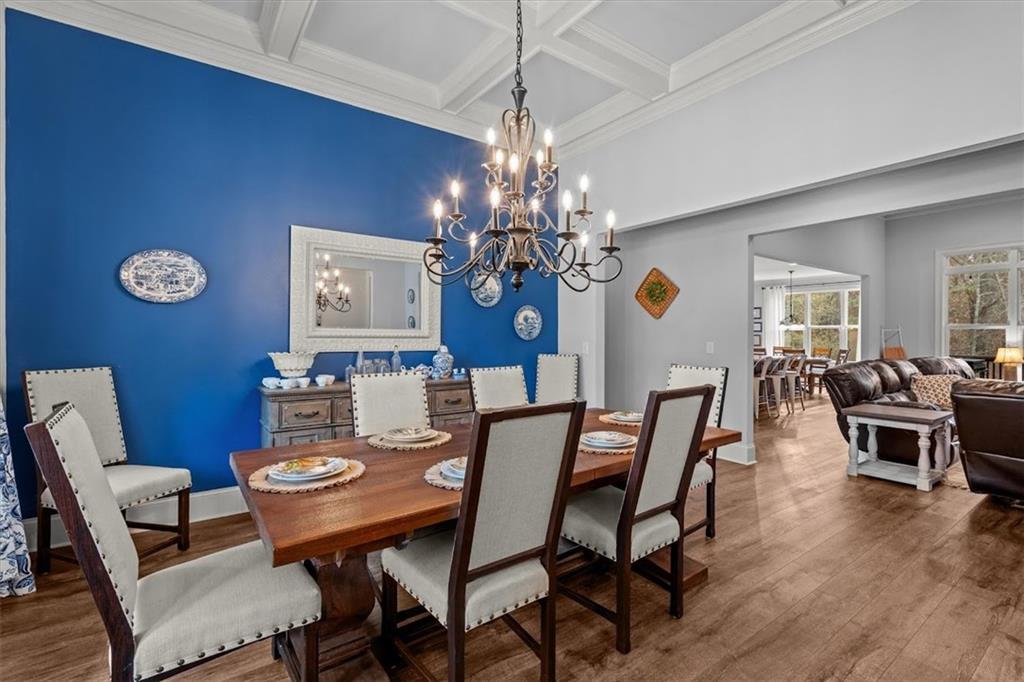 5330 North Helton Road Winston, GA 30187 - Photo 11 of 65 a view of a dining room with furniture wooden floor and chandelier