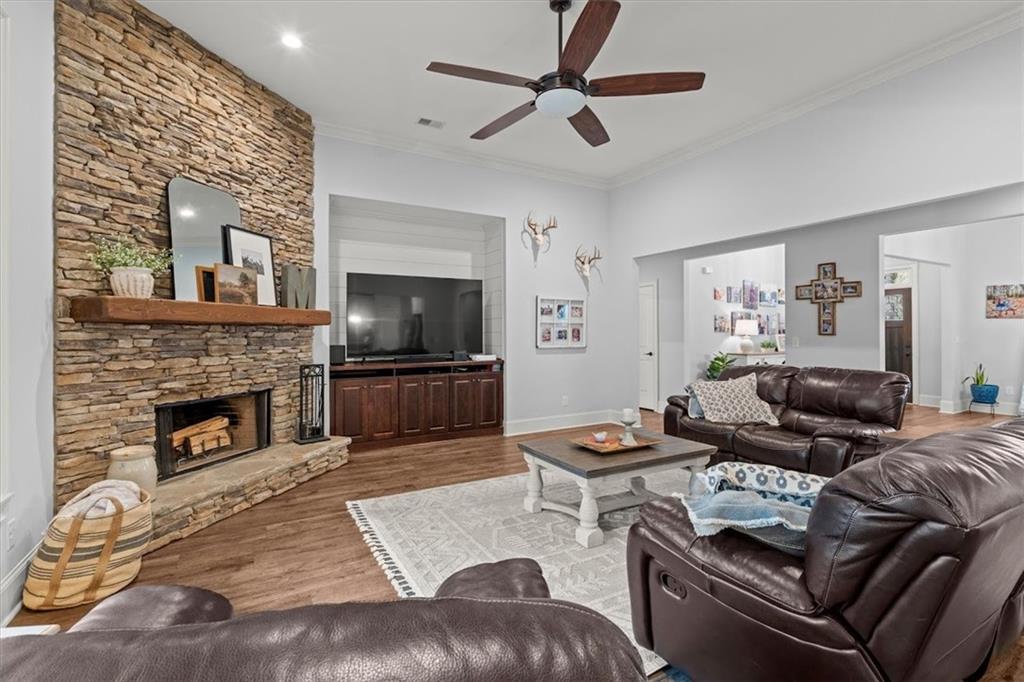 5330 North Helton Road Winston, GA 30187 - Photo 15 of 65 a living room with furniture and a fireplace