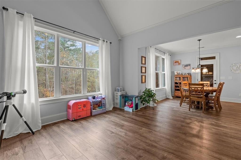 5330 North Helton Road Winston, GA 30187 - Photo 25 of 65 a living room with furniture and wooden floor