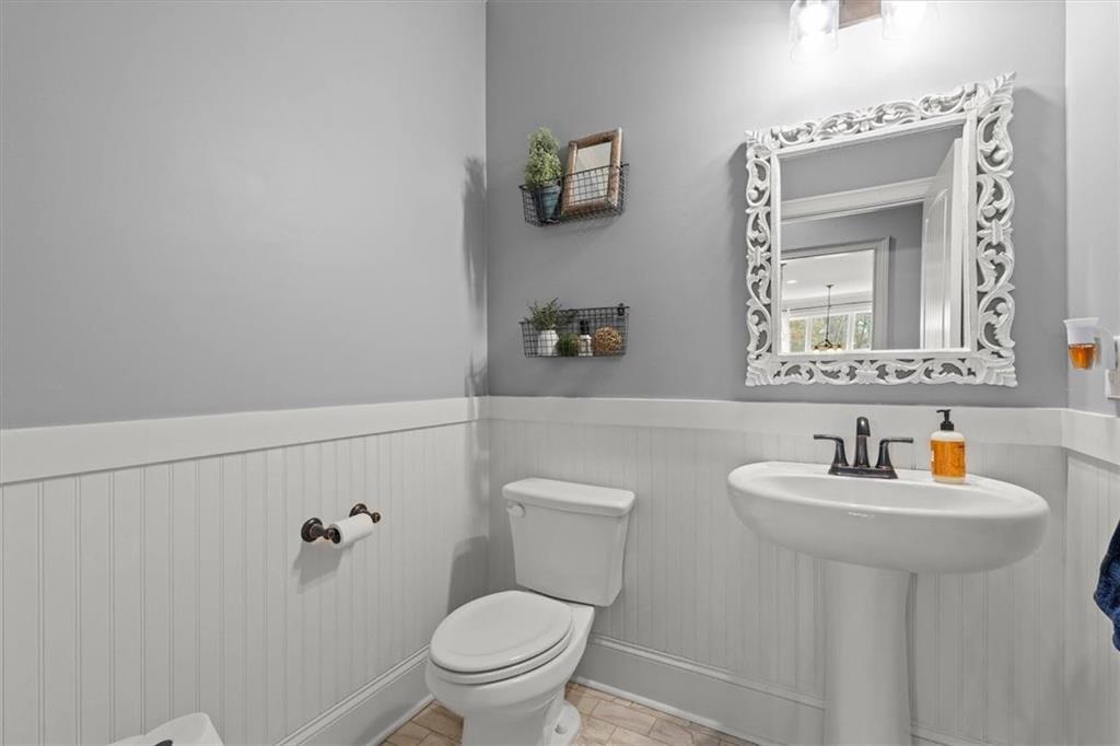 5330 North Helton Road Winston, GA 30187 - Photo 29 of 65 a bathroom with a sink toilet and mirror