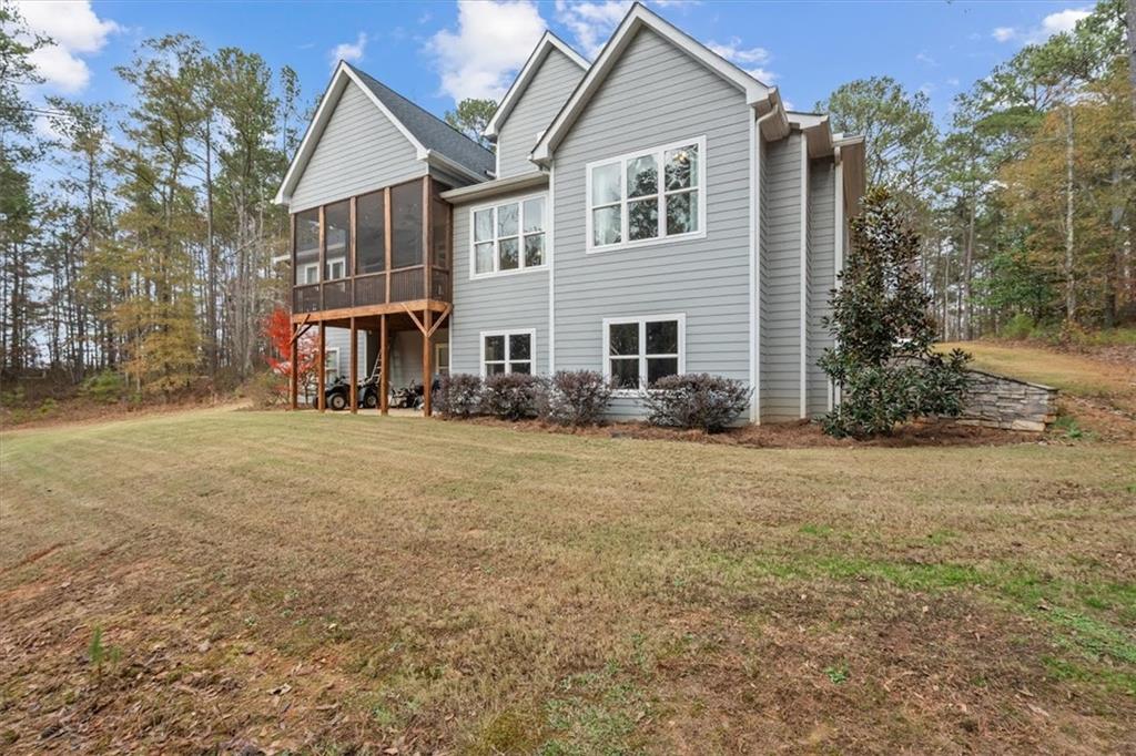 5330 North Helton Road Winston, GA 30187 - Photo 59 of 65 a front view of a house with garden