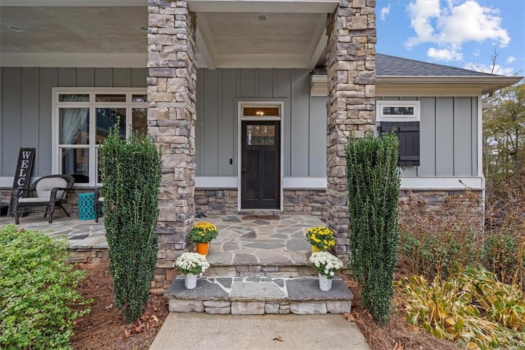 5330 North Helton Road Winston, GA 30187 - Photo 7 of 65 a front view of a house with outdoor seating