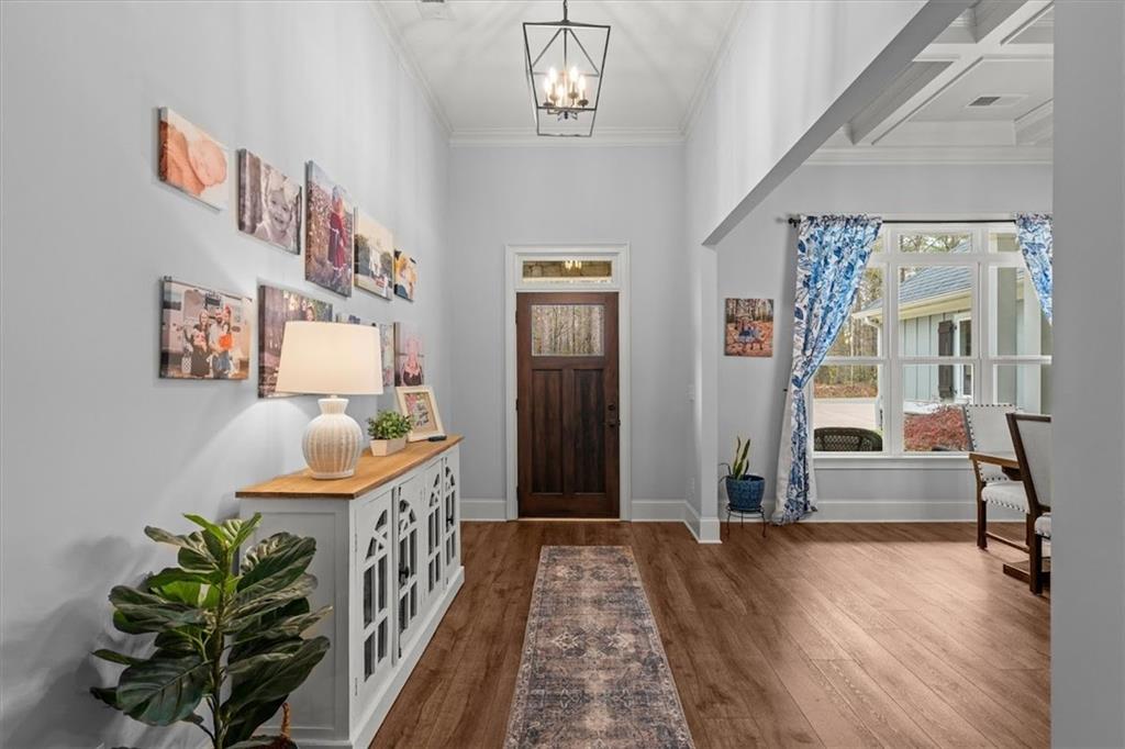5330 North Helton Road Winston, GA 30187 - Photo 9 of 65 a view of a hallway with wooden floor and windows