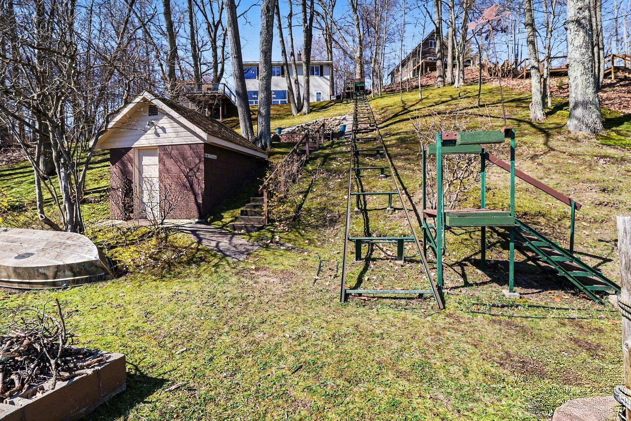 6302 East Interlochen Road Fountain, MI 49410 - Photo 27 of 34 Tram & Storage Shed by Water