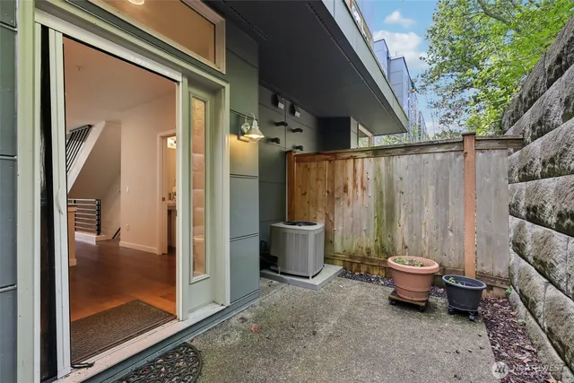 a outdoor space with patio furniture and a potted plant