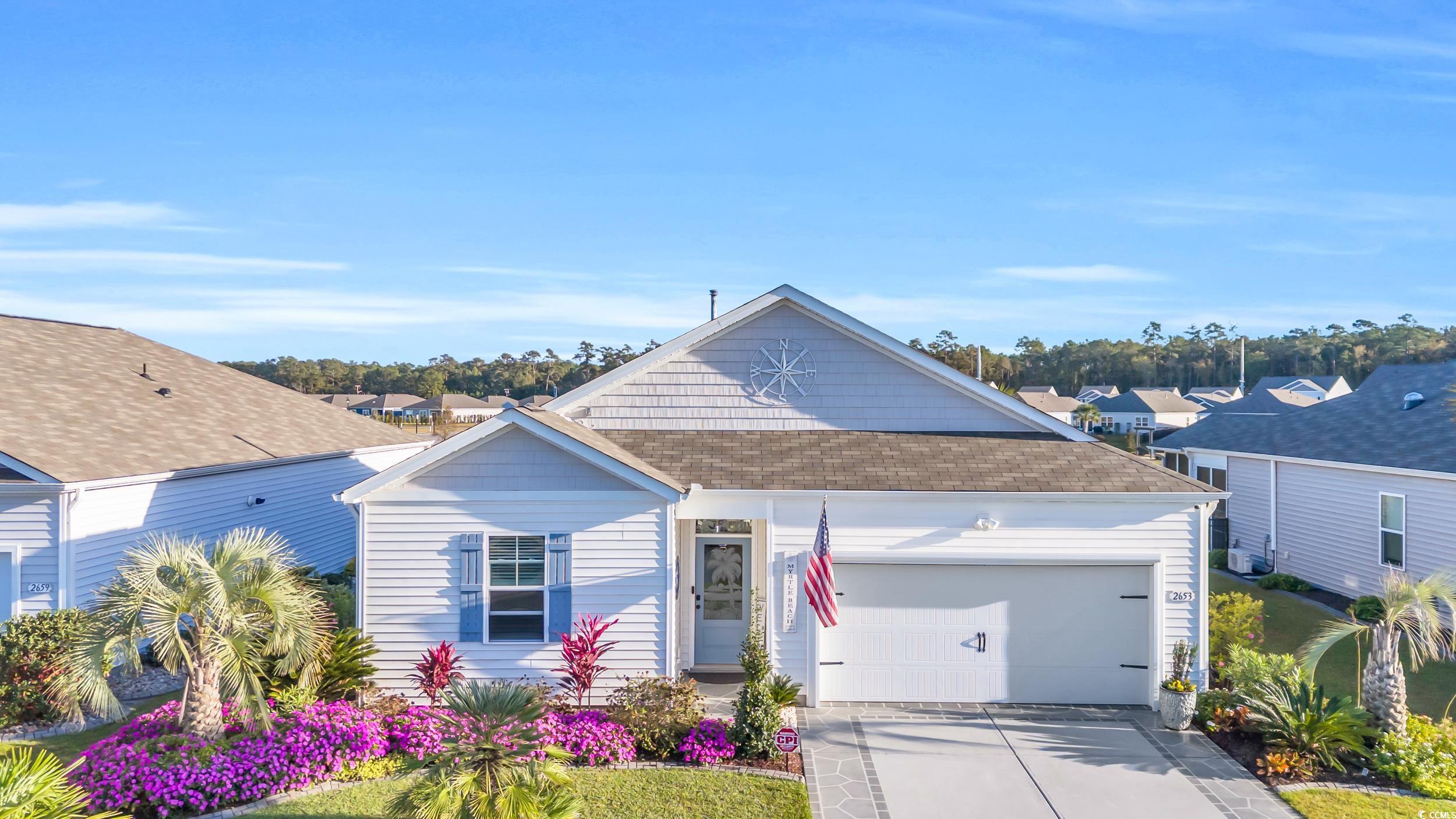 2653 Orion Loop Myrtle Beach, SC 29577 - Photo 1 of 39 View of front of property with an attached garage,