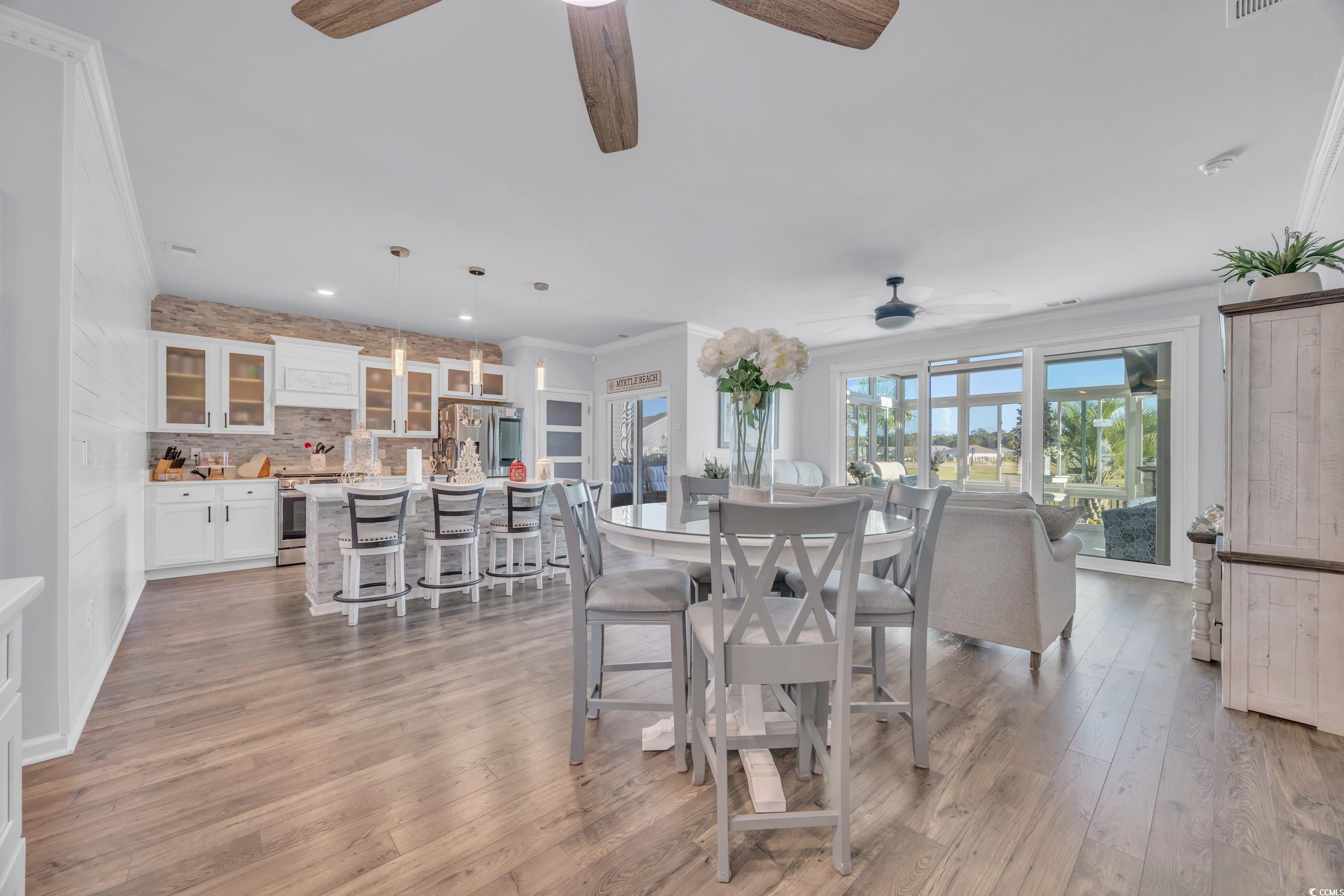 2653 Orion Loop Myrtle Beach, SC 29577 - Photo 11 of 39 Dining room featuring ceiling fan, light wood-type