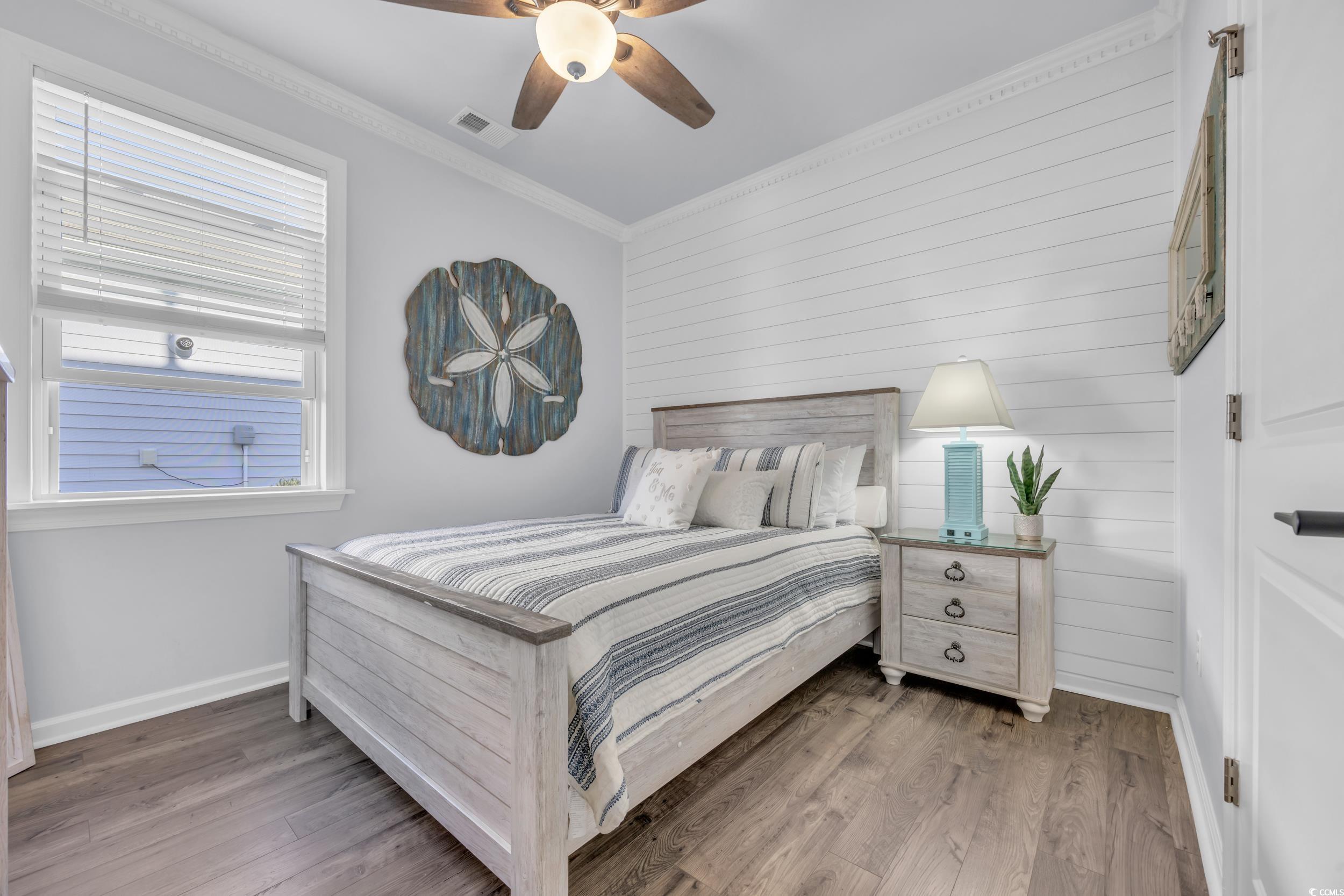 2653 Orion Loop Myrtle Beach, SC 29577 - Photo 23 of 39 Bedroom with baseboards, wood finished floors, orn