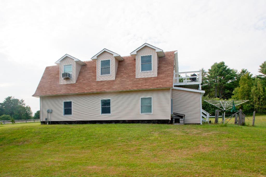 1223 Great Pond Road Aurora, ME 04408 - Photo 5 of 28 Backyard clothes line