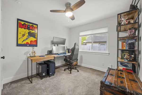 a room with furniture and a window