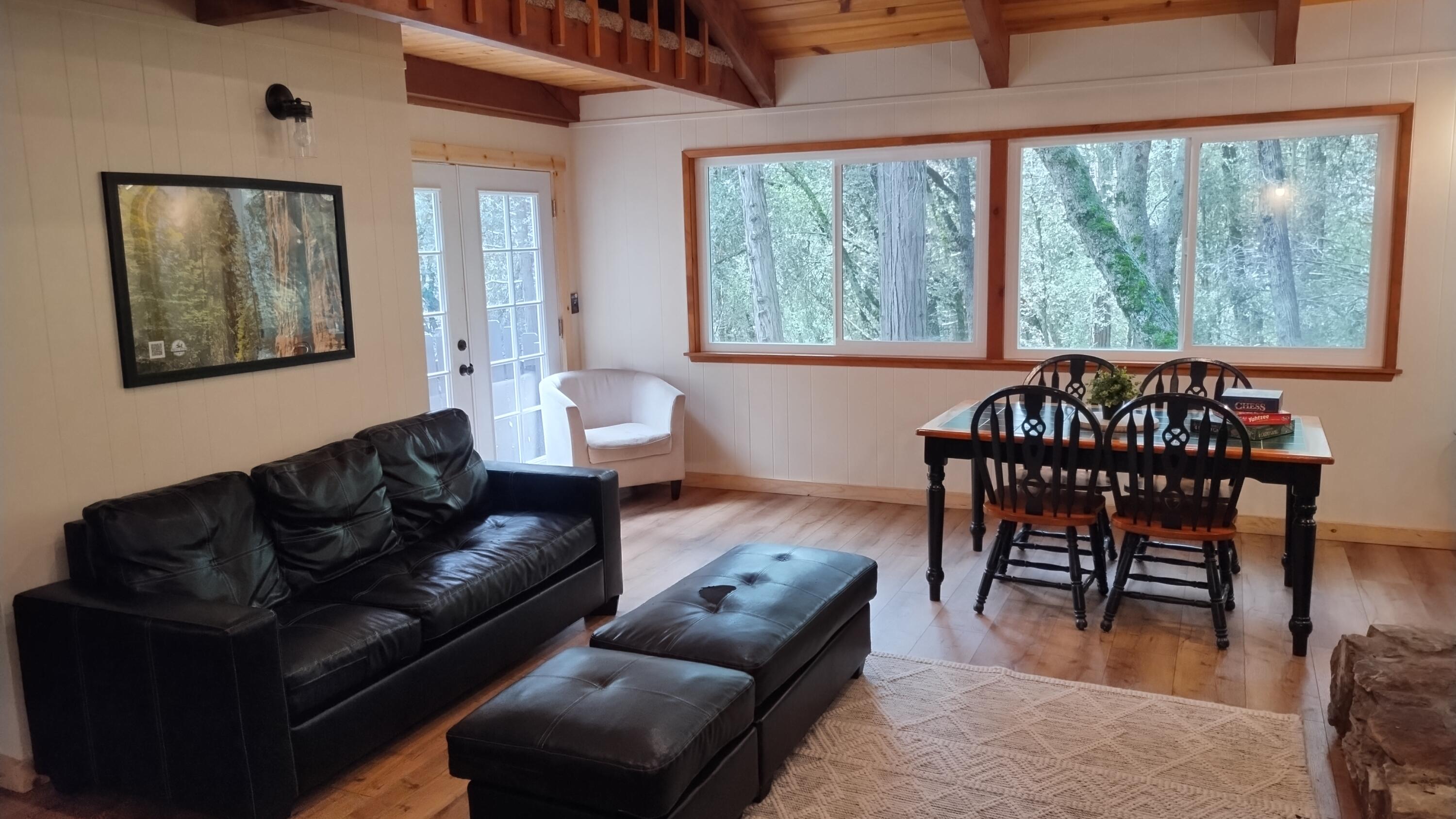 1693 Forest Rte 21S94 Camp Nelson, CA 93265 - Photo 29 of 86 a living room with furniture and a large window