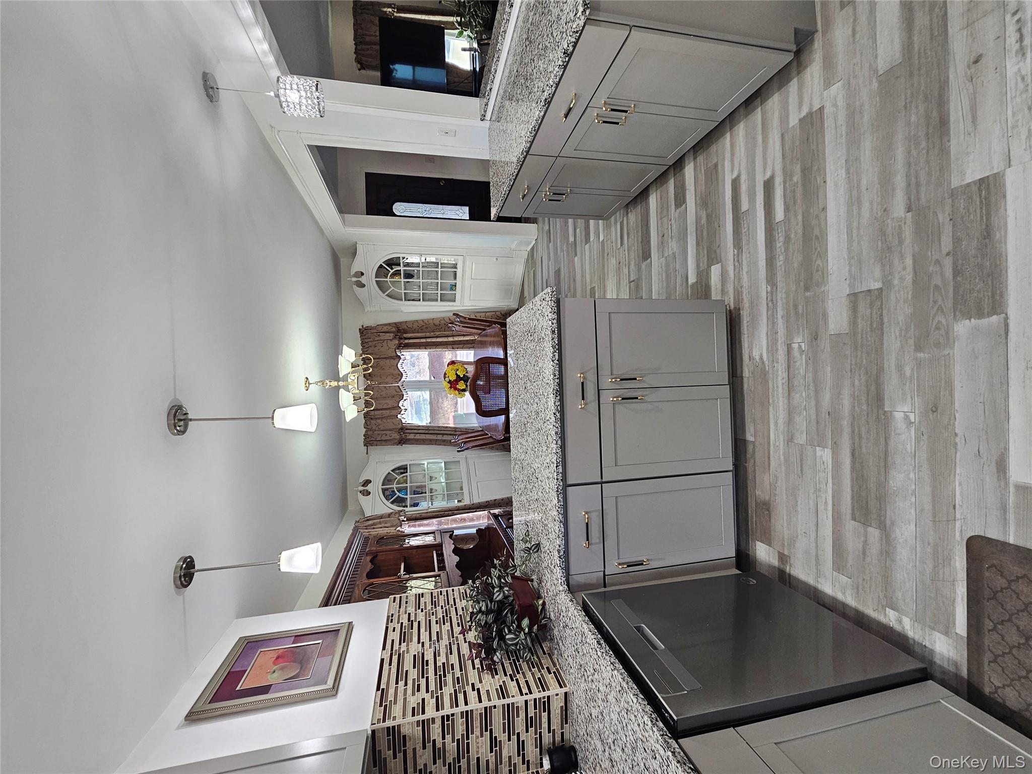 88 Innis Avenue Poughkeepsie, NY 12601 - Photo 11 of 33 a kitchen with a sink and a refrigerator