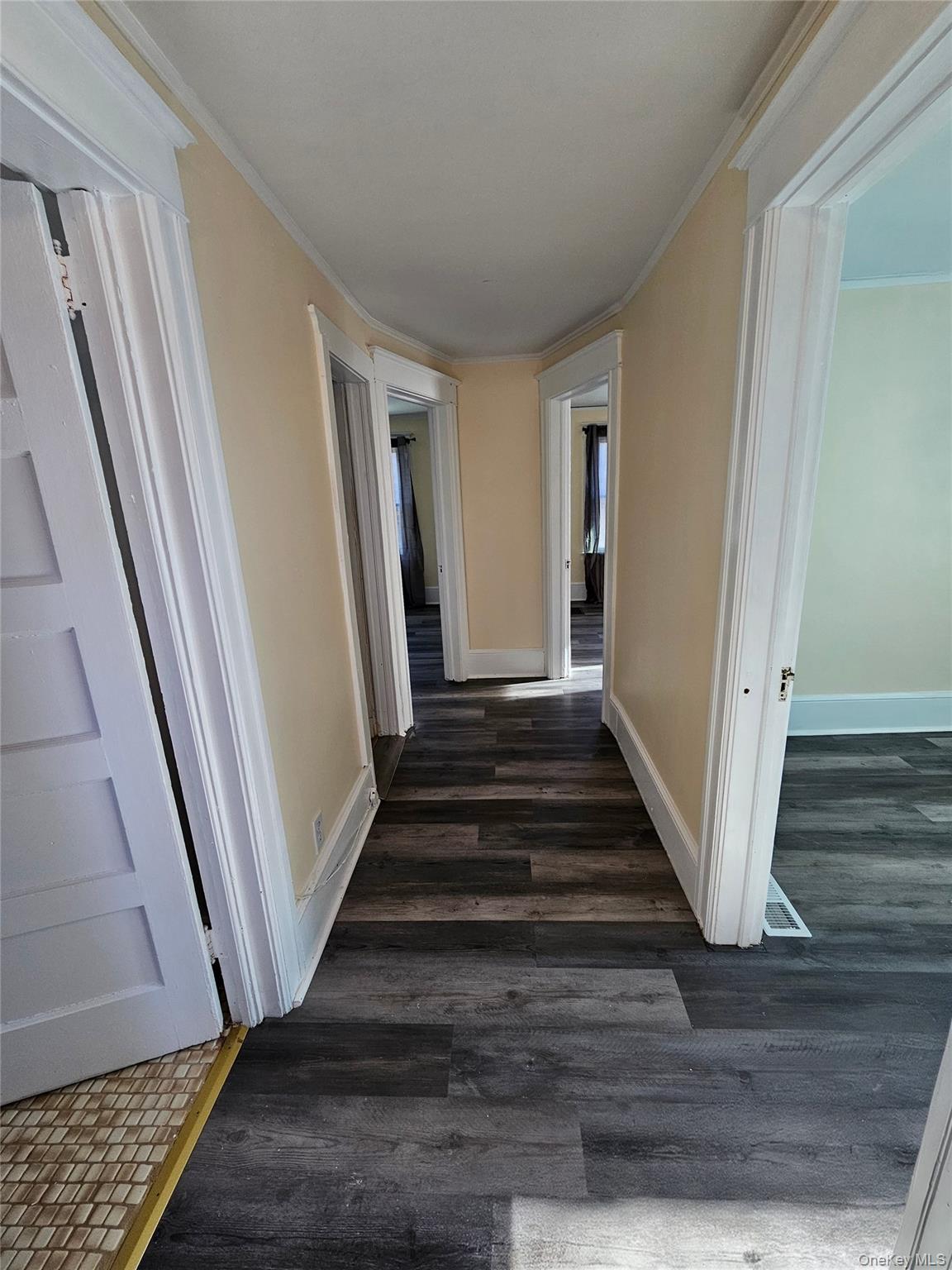 88 Innis Avenue Poughkeepsie, NY 12601 - Photo 27 of 33 a view of a hallway with wooden floor and staircase