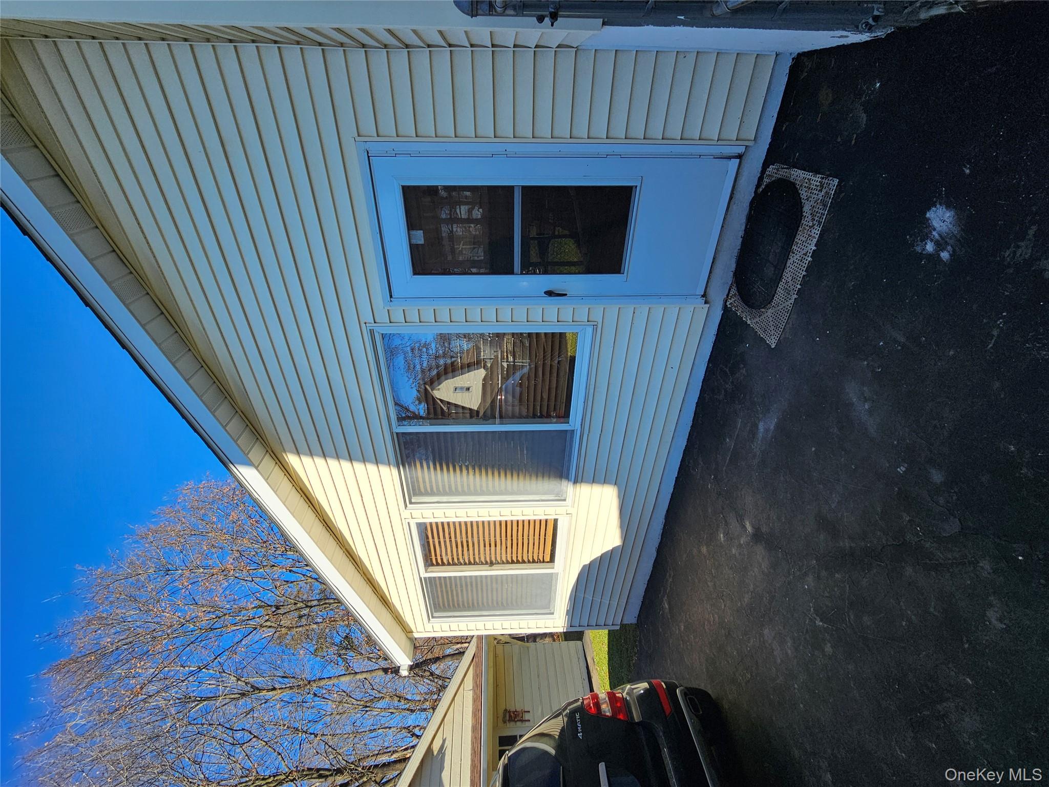 88 Innis Avenue Poughkeepsie, NY 12601 - Photo 10 of 33 a front view of a house with a yard