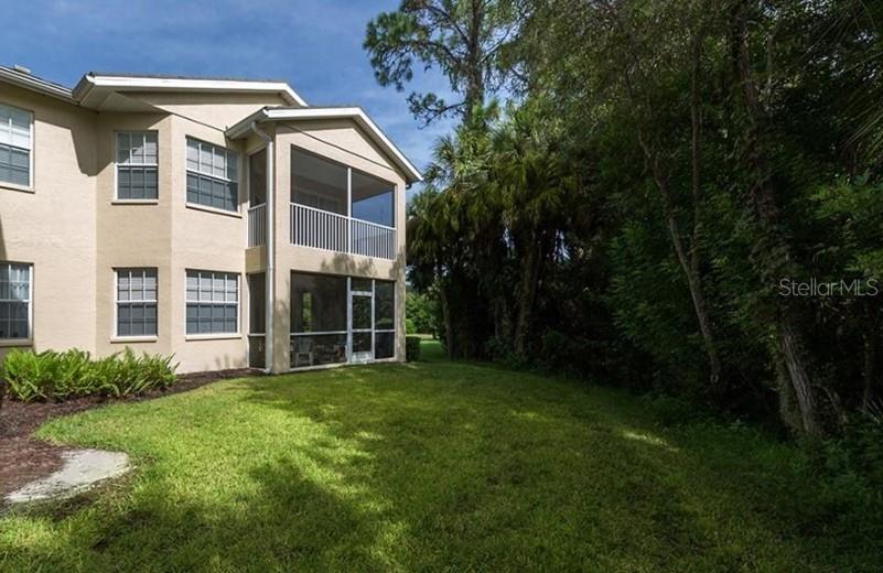 a view of a back yard of the house