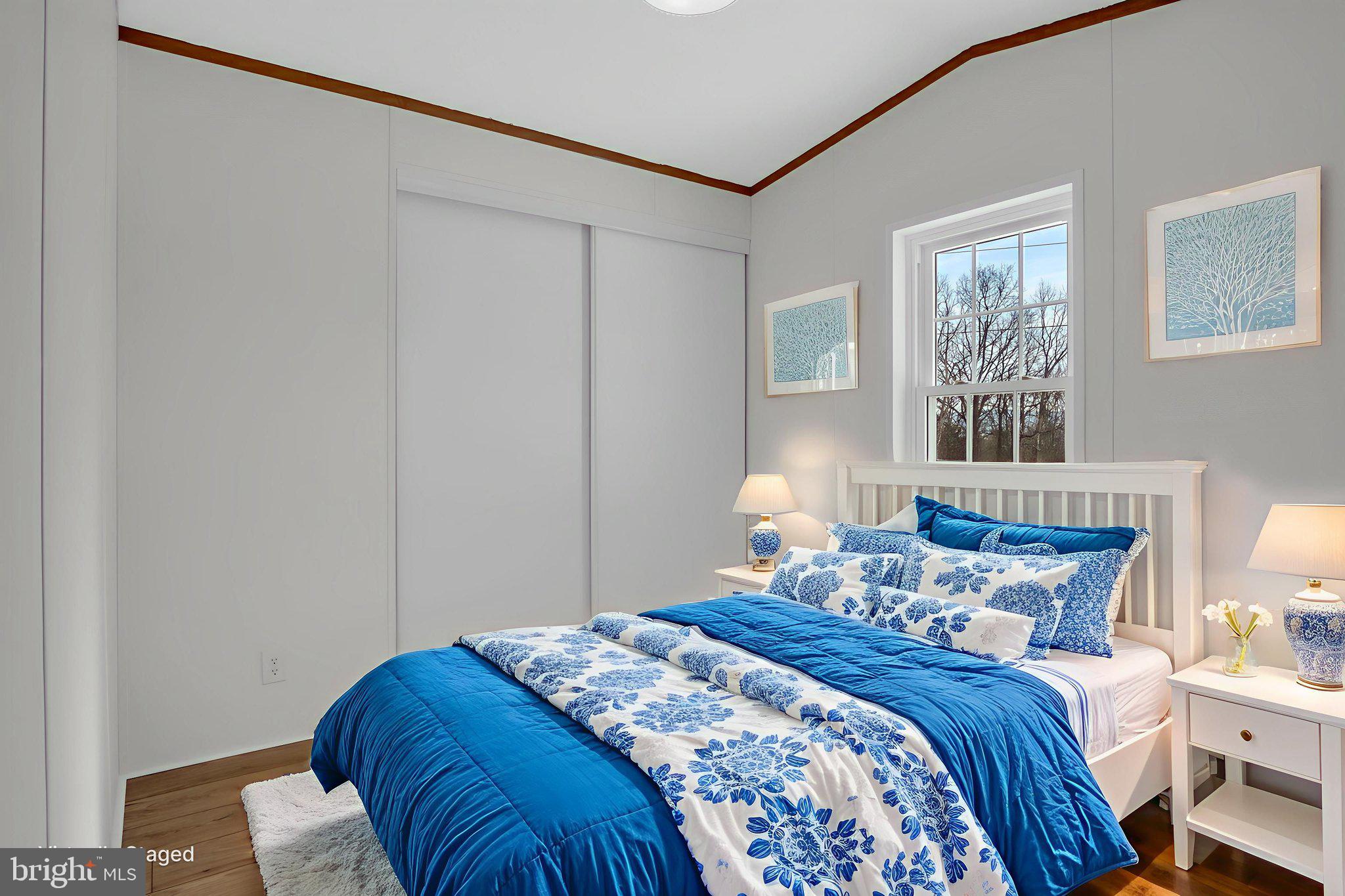 821 Windy Hill Road Shermans Dale, PA 17090 - Photo 19 of 30 a bedroom with a bed and wooden floor