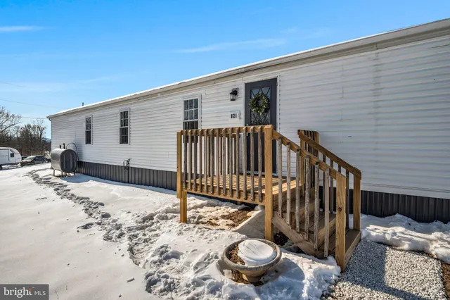 a view of a patio with a yard