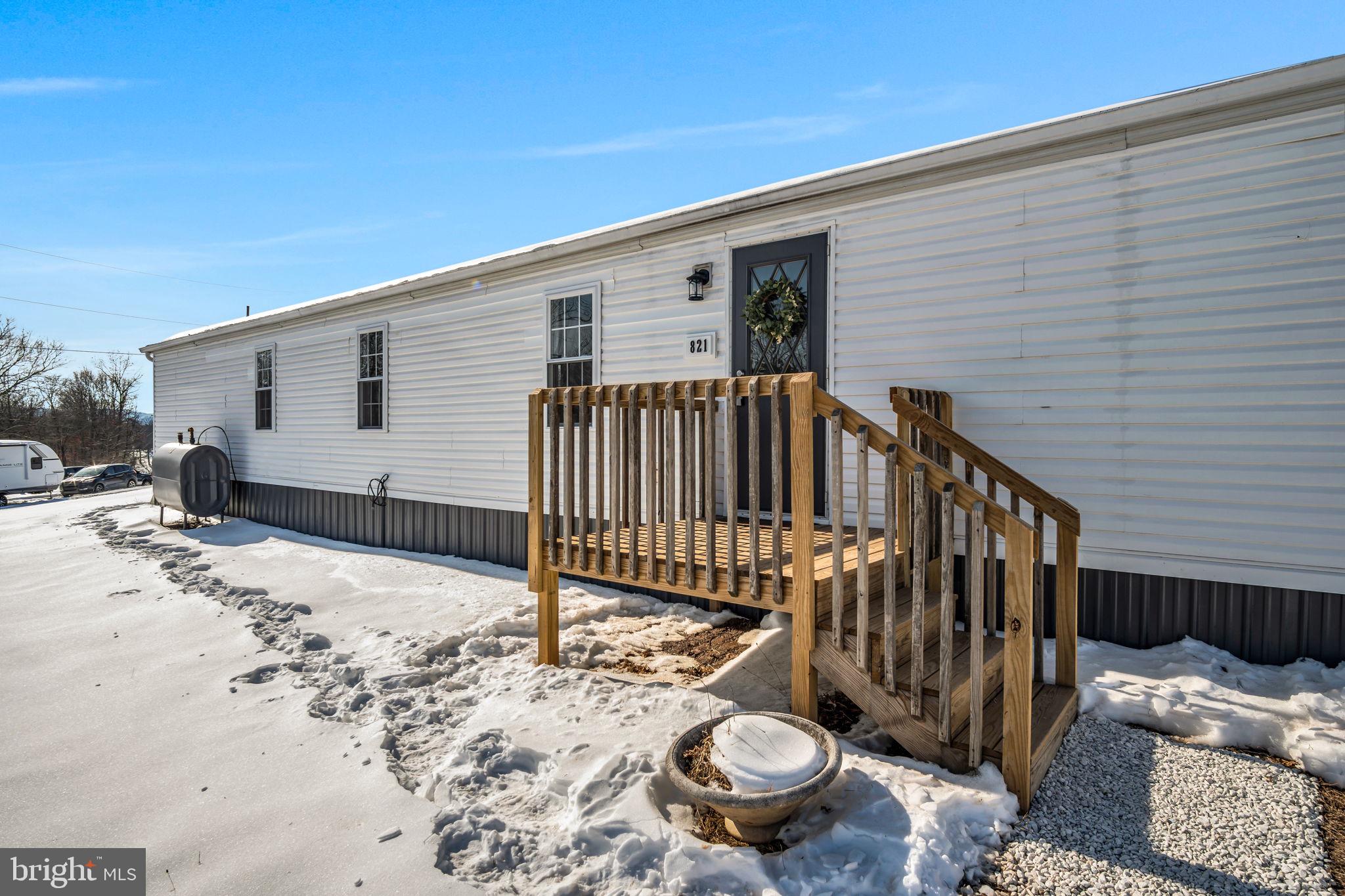 821 Windy Hill Road Shermans Dale, PA 17090 - Photo 23 of 30 a view of a patio with a yard
