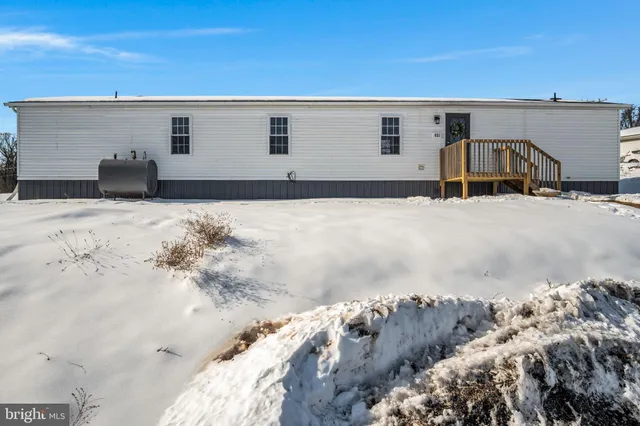 a front view of house with a yard