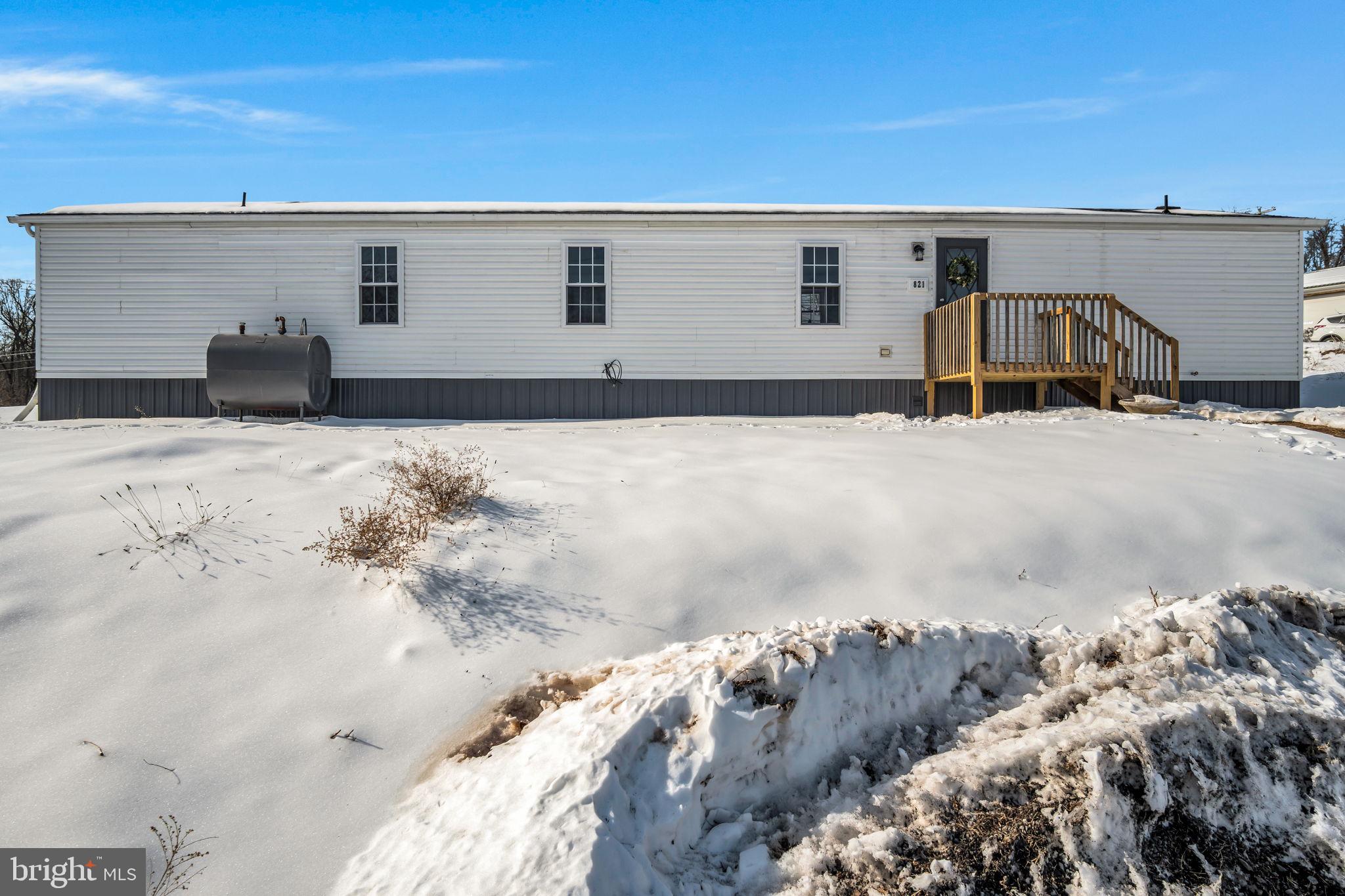 821 Windy Hill Road Shermans Dale, PA 17090 - Photo 26 of 30 a front view of house with a yard