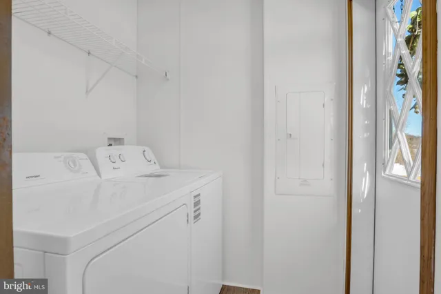 a utility room with dryer and washer