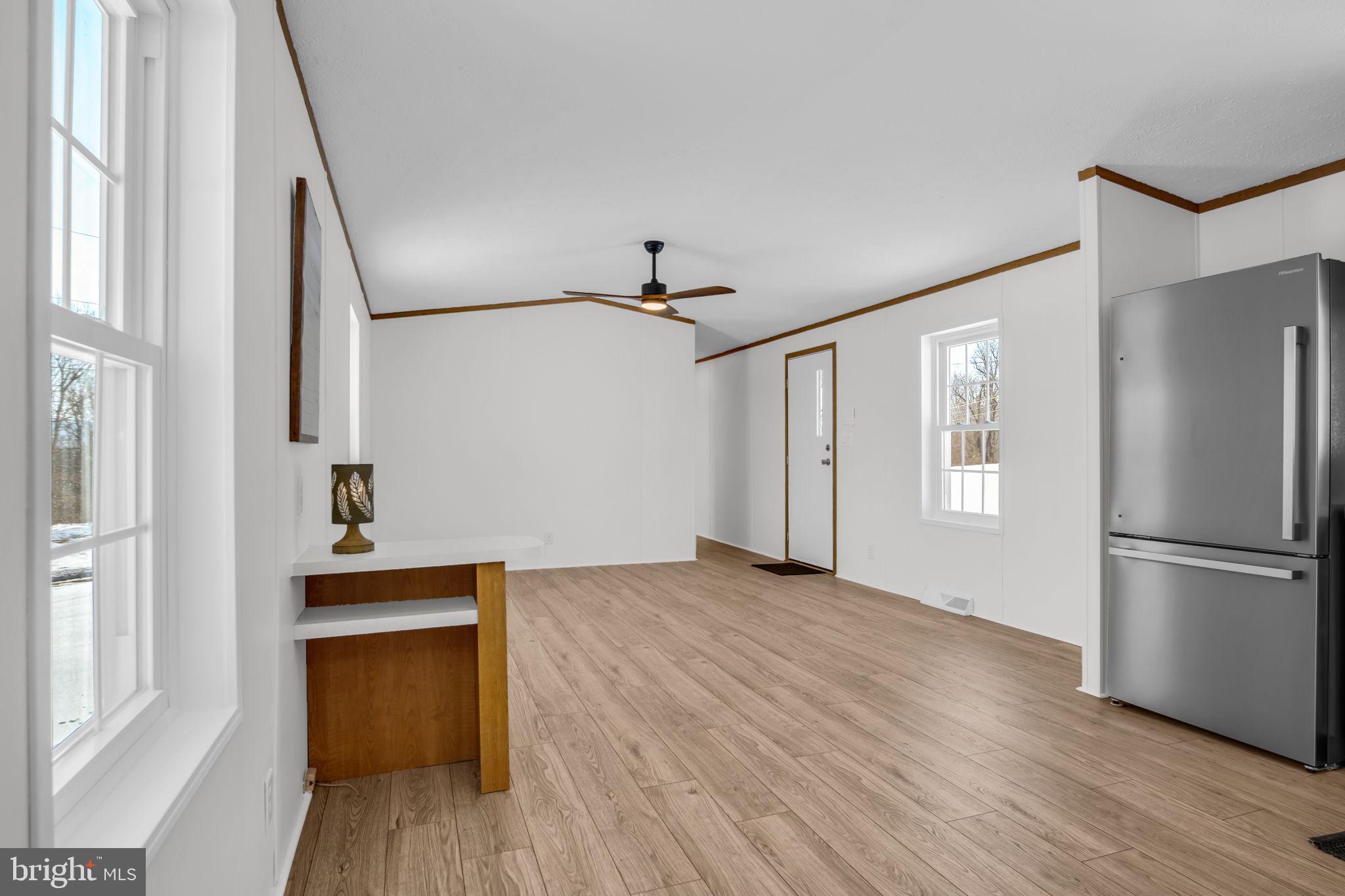 821 Windy Hill Road Shermans Dale, PA 17090 - Photo 9 of 30 a view of empty room with wooden floor and window