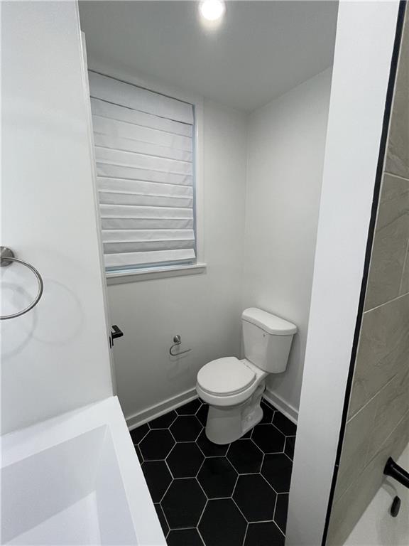 107 Shoup Street, Unit 2 Pittsburgh, PA 15209 - Photo 17 of 40 a bathroom with a toilet a sink and a shower