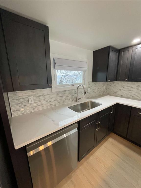107 Shoup Street, Unit 2 Pittsburgh, PA 15209 - Photo 32 of 40 a kitchen with a sink and cabinets