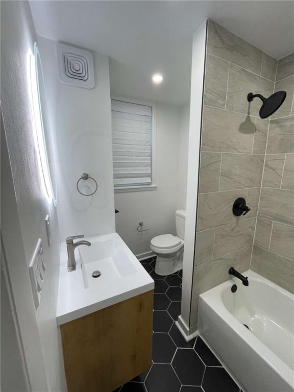 107 Shoup Street, Unit 2 Pittsburgh, PA 15209 - Photo 35 of 40 a bathroom with a sink a toilet and shower