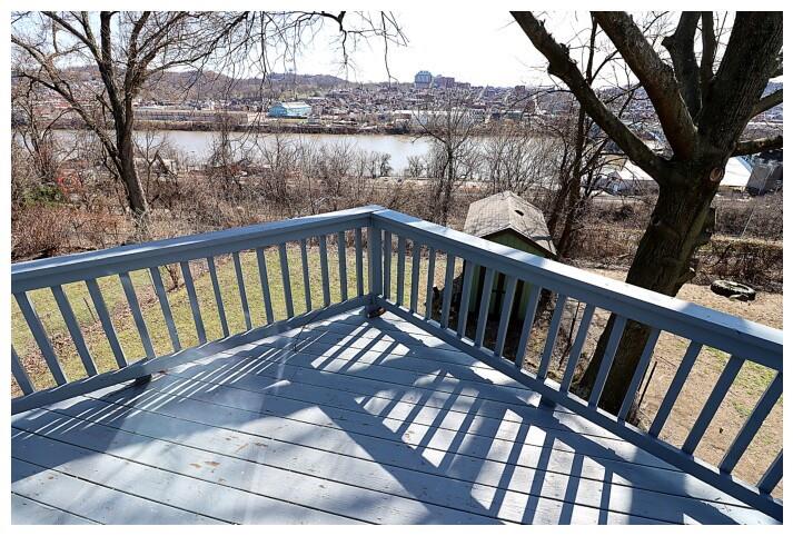 107 Shoup Street, Unit 2 Pittsburgh, PA 15209 - Photo 5 of 40 a view of balcony with wooden floor and fence