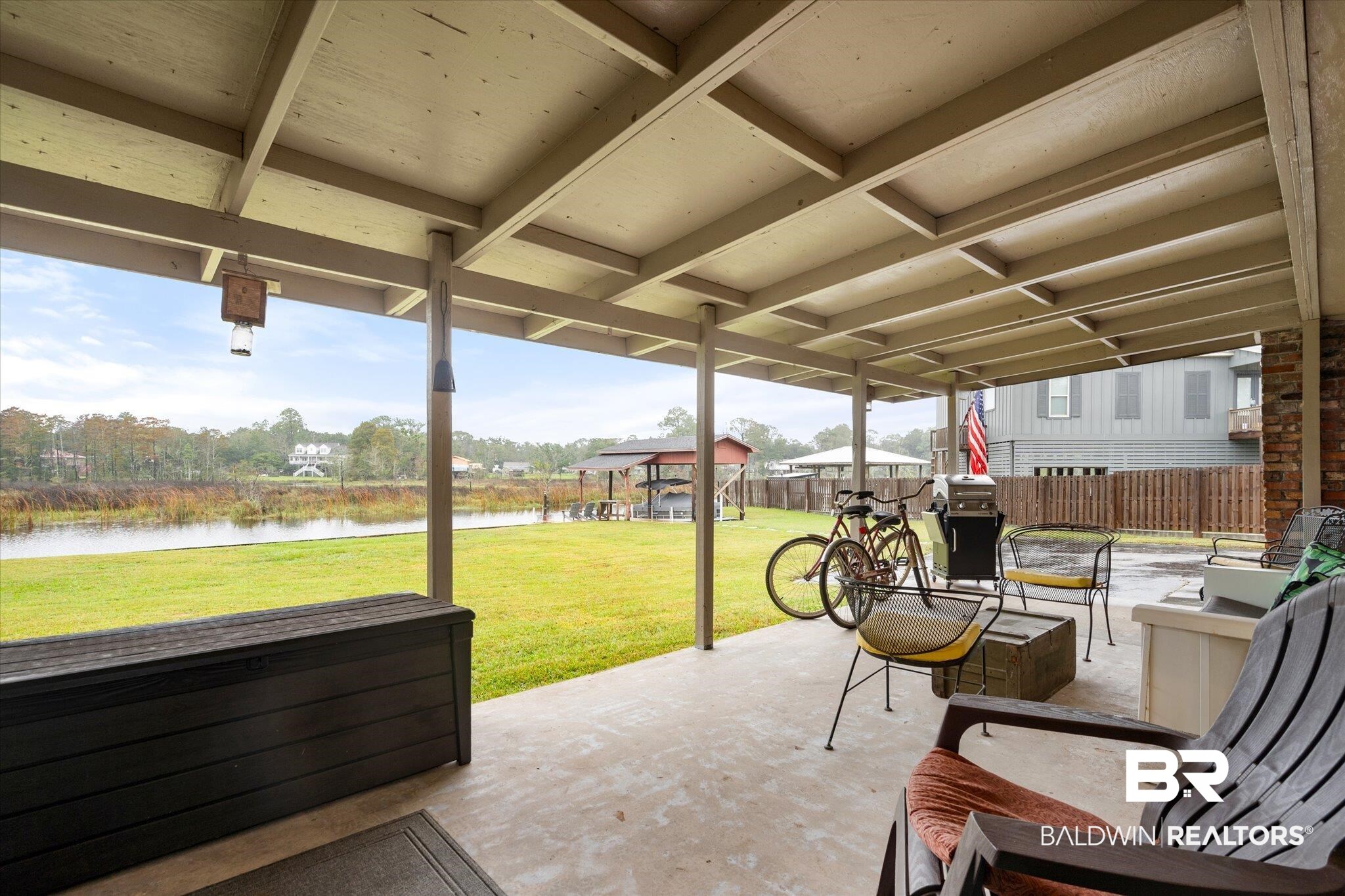 4570 Benson Road Mobile, AL 36619 - Photo 21 of 34 View of patio / terrace featuring a water view