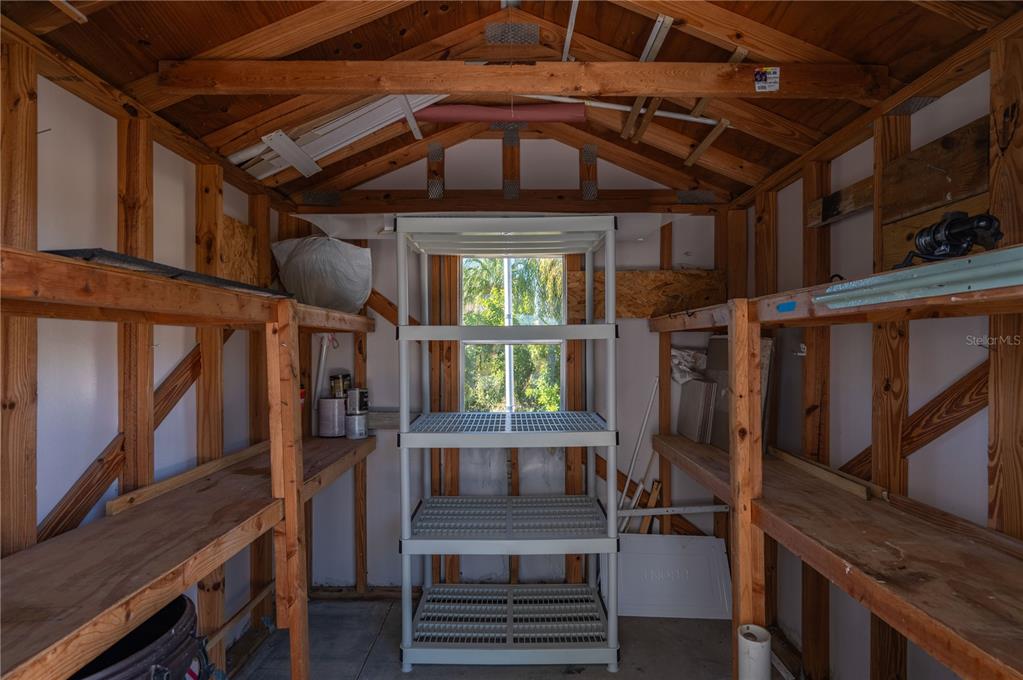 24437 Harbor View Road, Unit 114 Punta Gorda, FL 33980 - Photo 31 of 56 a view of an entryway with wooden floor