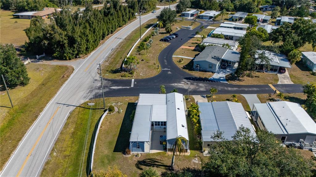 24437 Harbor View Road, Unit 114 Punta Gorda, FL 33980 - Photo 43 of 55 an aerial view of residential houses with outdoor space