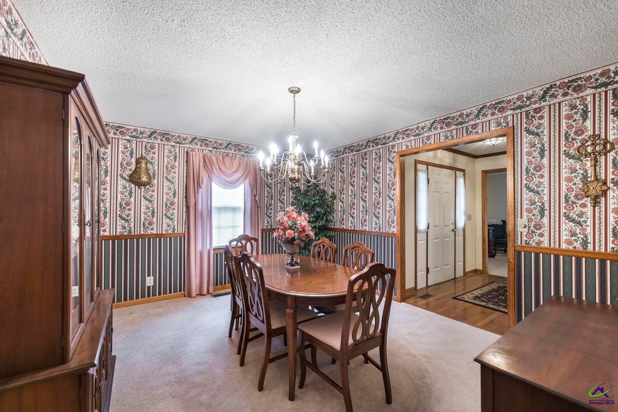 5731 School Road Macon, GA 31216 - Photo 15 of 33 Separate dining room ideal for hosting family and friends.