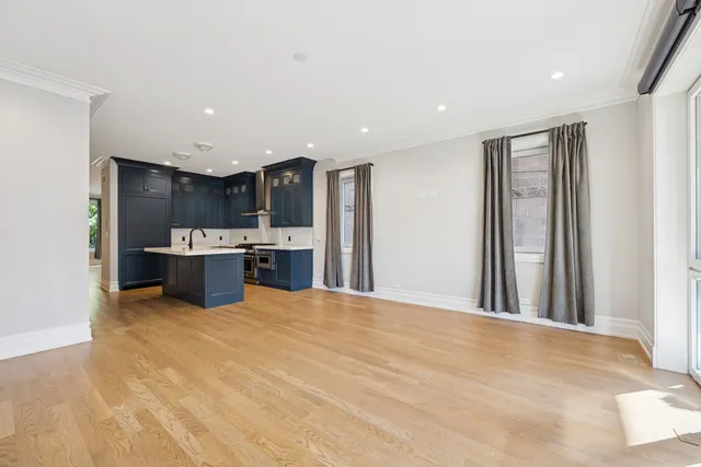 a view of a kitchen with a stove cabinets and a kitchen