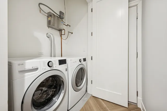 a utility room with dryer and washer