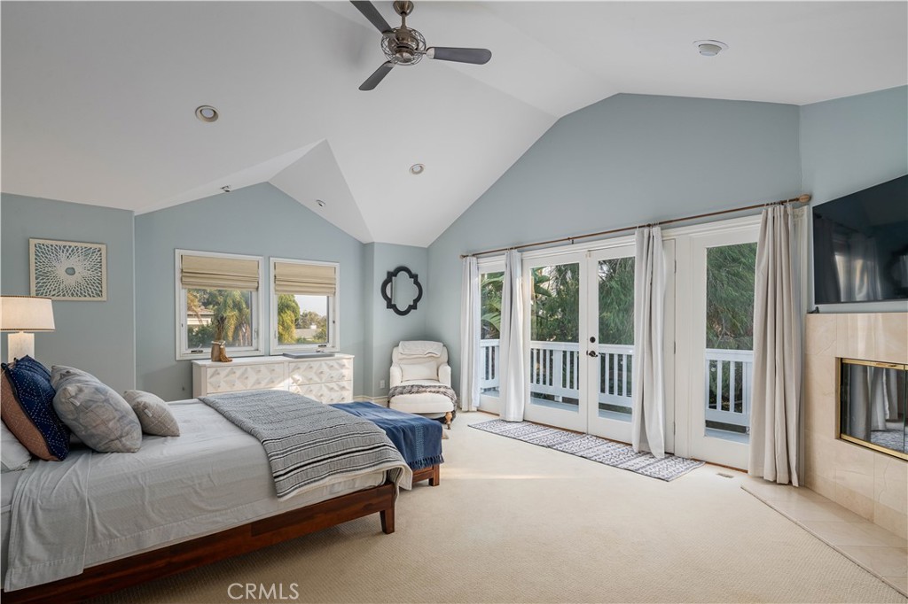 1534 3rd Street Manhattan Beach, CA 90266 - Photo 12 of 21 a bedroom with a large bed and a large window
