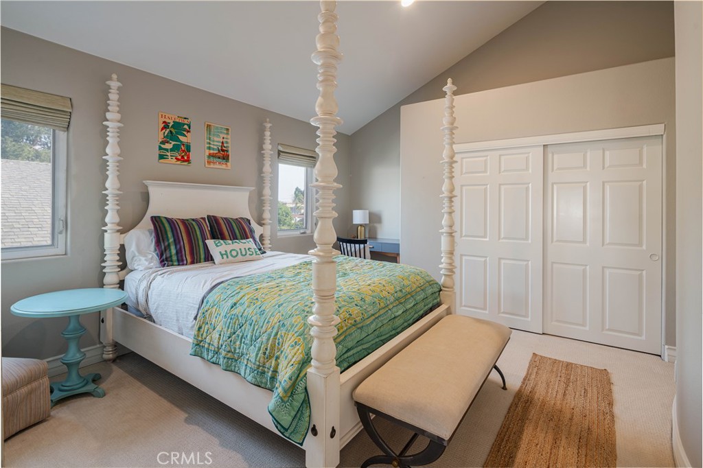 1534 3rd Street Manhattan Beach, CA 90266 - Photo 15 of 21 a bedroom with a bed and wooden floor