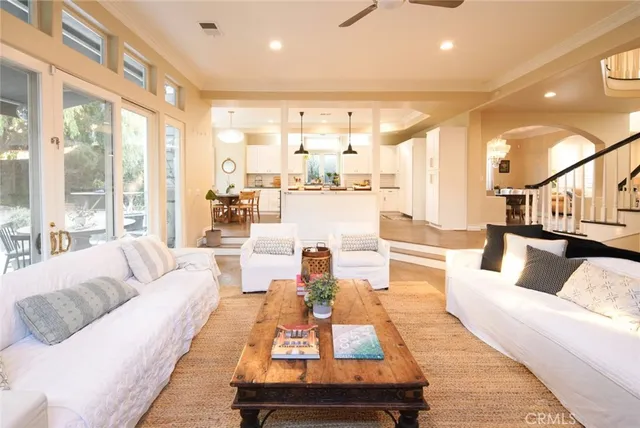 a living room with furniture and a table
