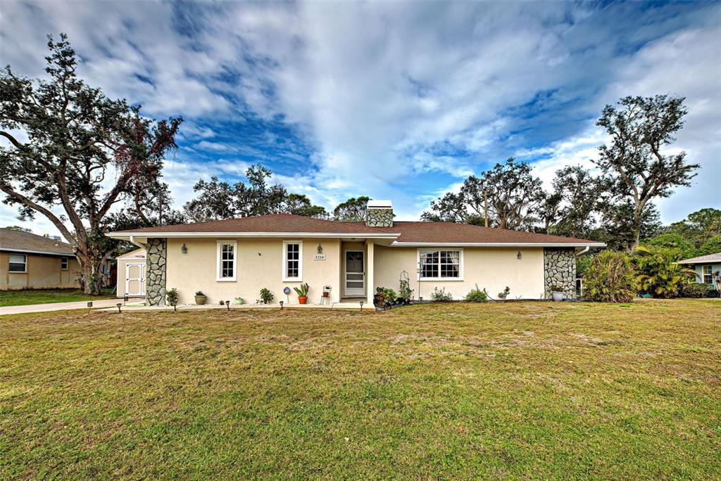 5280 Rolla Road Venice, FL 34293 - Photo 1 of 1 front view of a house and a yard