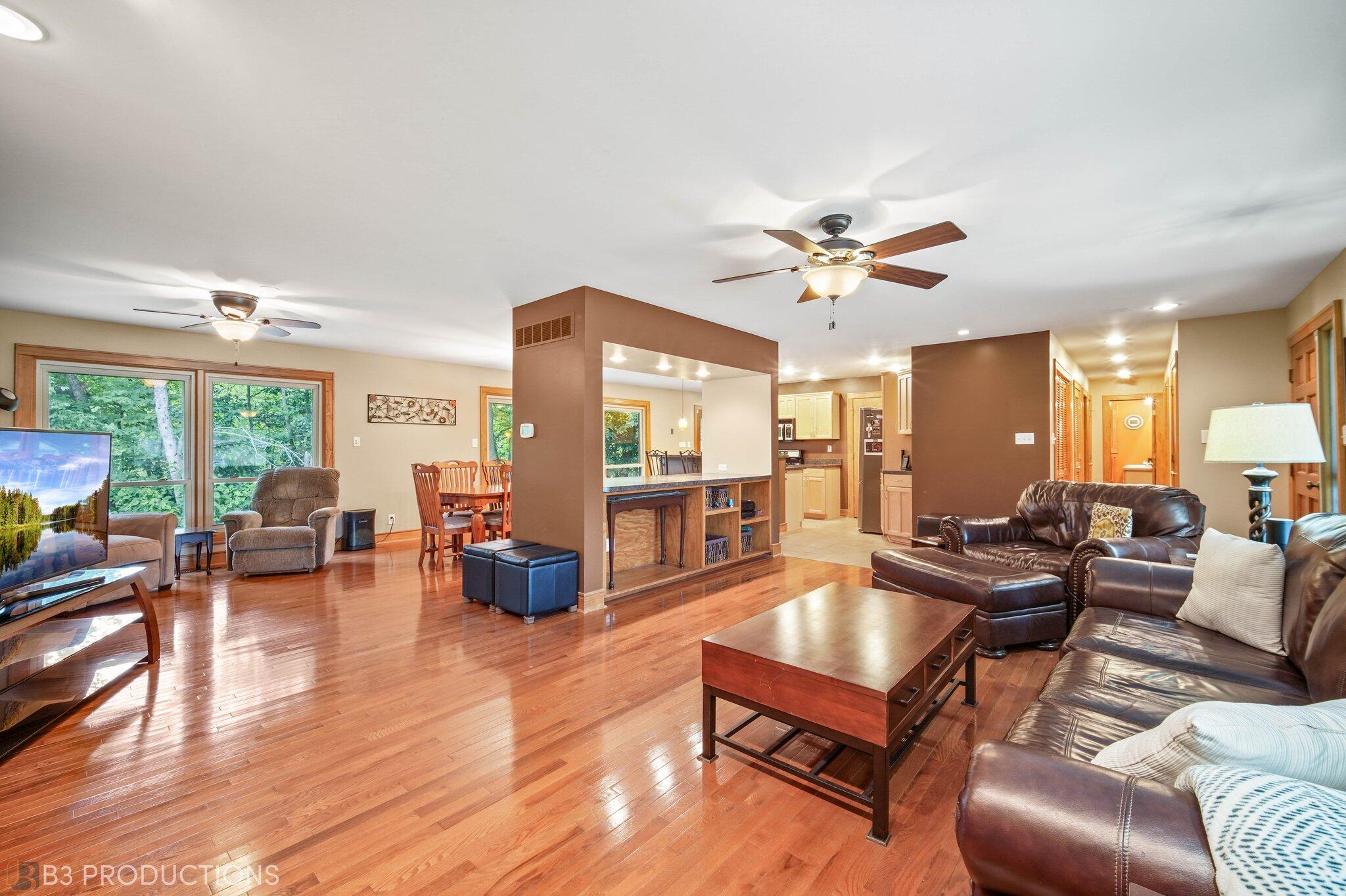 55 Deep River Drive Hobart, IN 46342 - Photo 9 of 21 a living room with furniture and wooden floor